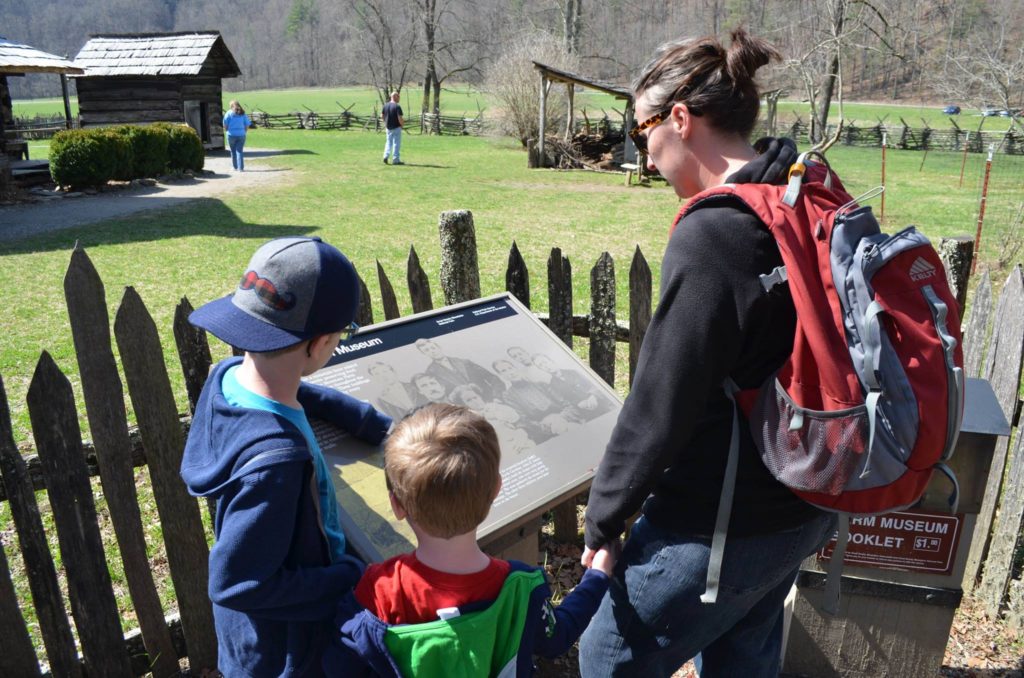 Abby and the kids checking out the map of an old homestead in the Great Smoky Mountain National Park.